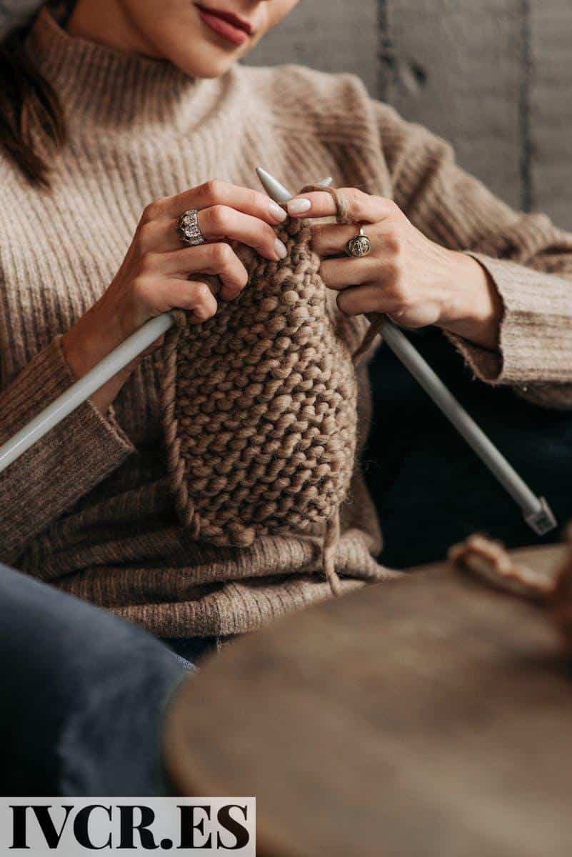 Woman Knitting a Brown Yarn