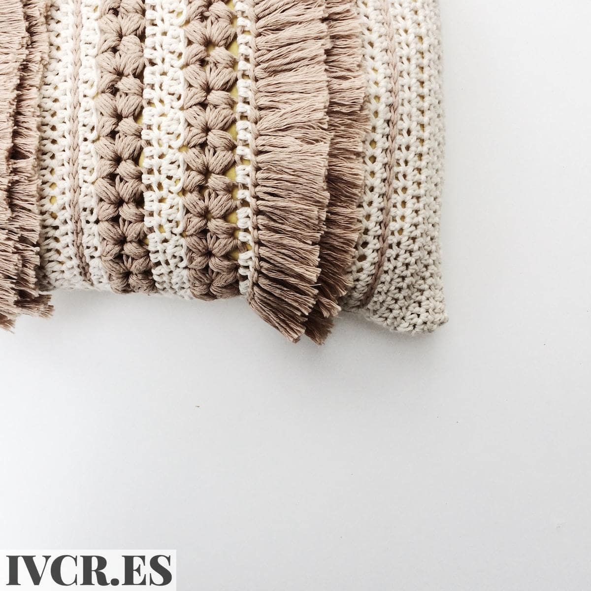 white and brown knit textile
